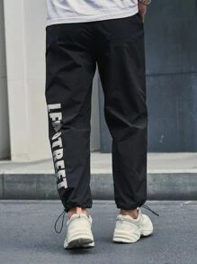 Manfinity Hombres Pantalones rompevientos con estampado de letra bajo con cordón - Negro - Ver 2