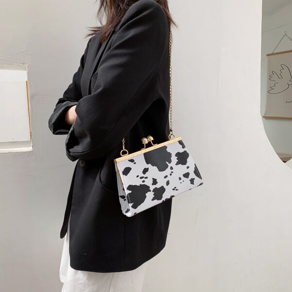 

Cow Pattern Kiss Lock Chain Bag, Black and white
