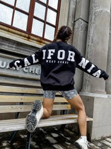 SHEIN Unity Sudadera con estampado de slogan de hombros caídos - Negro - Ver 1