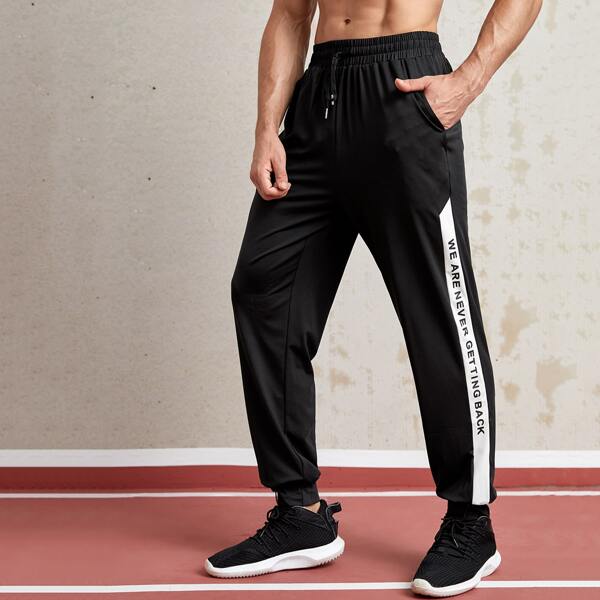 

Men Contrast Sideseam Slogan Graphic Sport Pants, Black