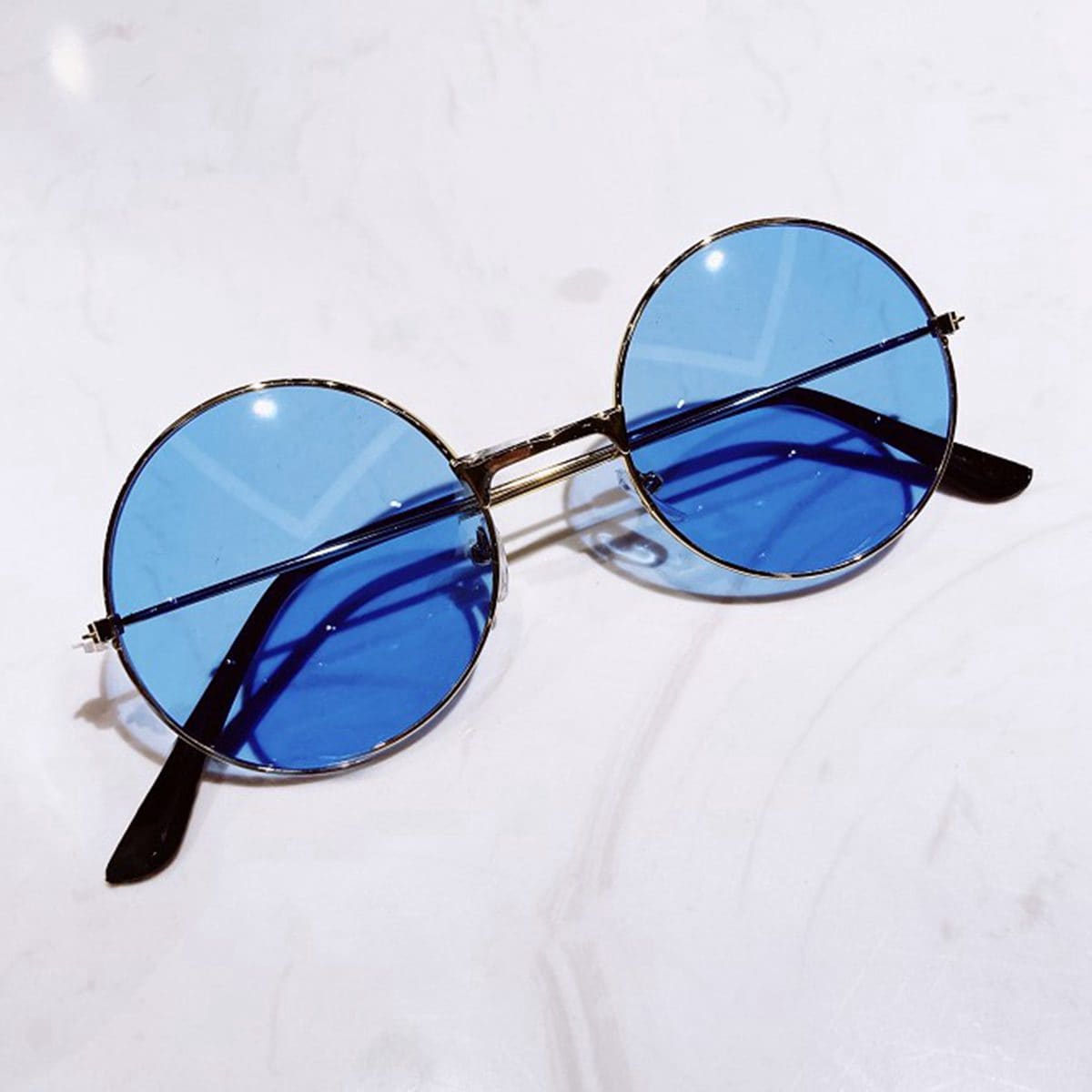 

Round Frame Tinted Lens Sunglasses