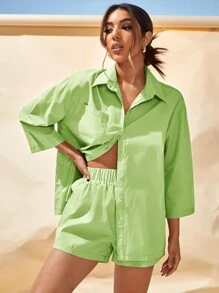 胸口袋寬鬆襯衫和短褲套裝