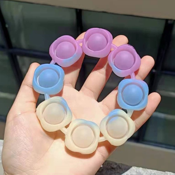 

1pc Random Photosensitive Push Pop Bubble, Multicolor