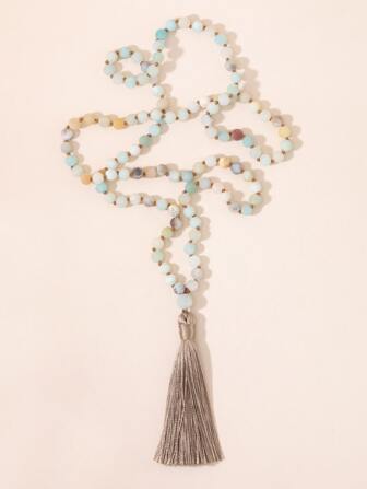 قلادة شرابة مطرز بالخرز