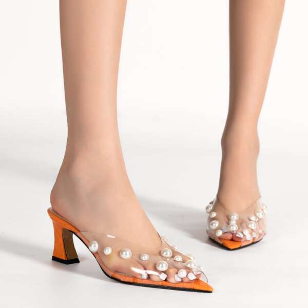 

Clear Peep Toe Sculptural Heeled Mules