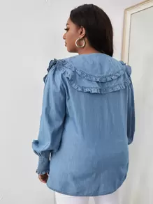 Top in denim collo pronunciato manica a lanterna