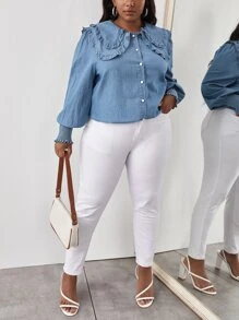 Top in denim collo pronunciato manica a lanterna