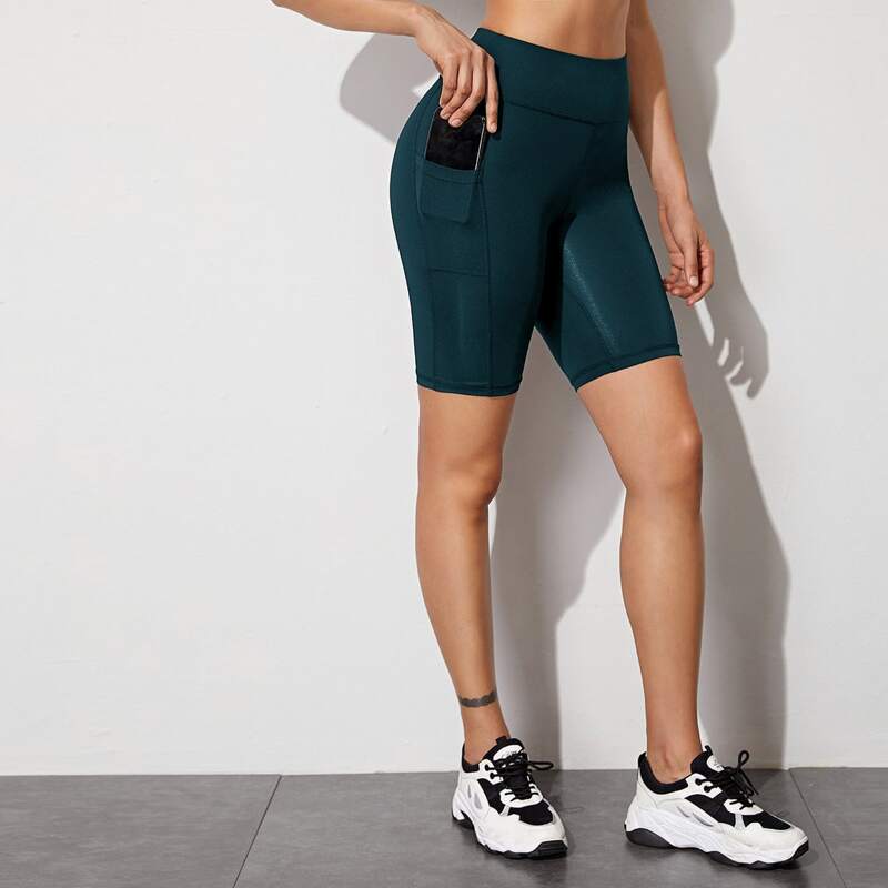 

Solid Biker Shorts With Phone Pocket, Dark green