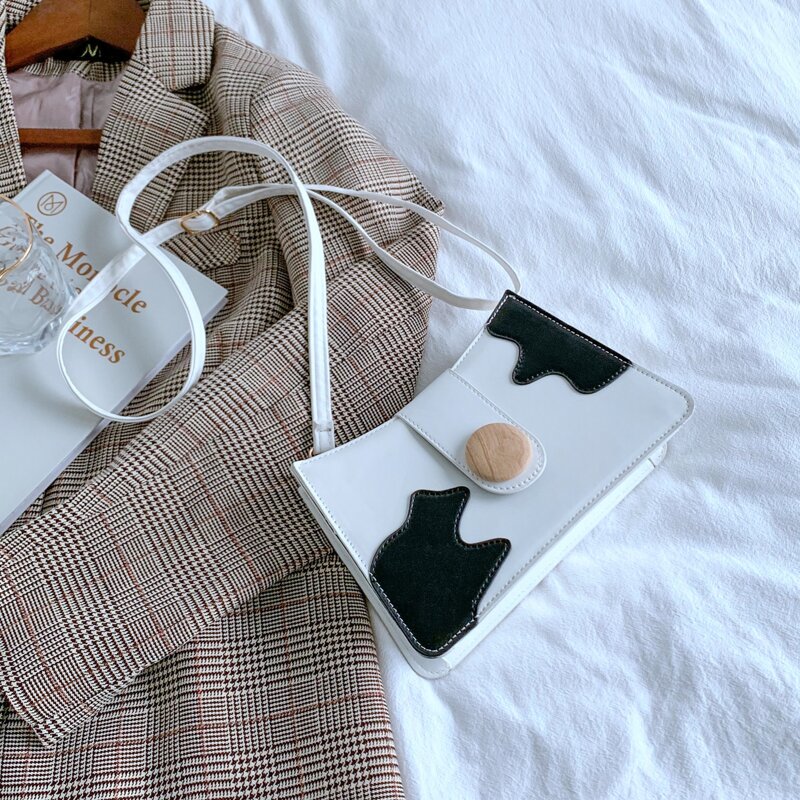 

Cow Pattern Crossbody Bag, Black and white