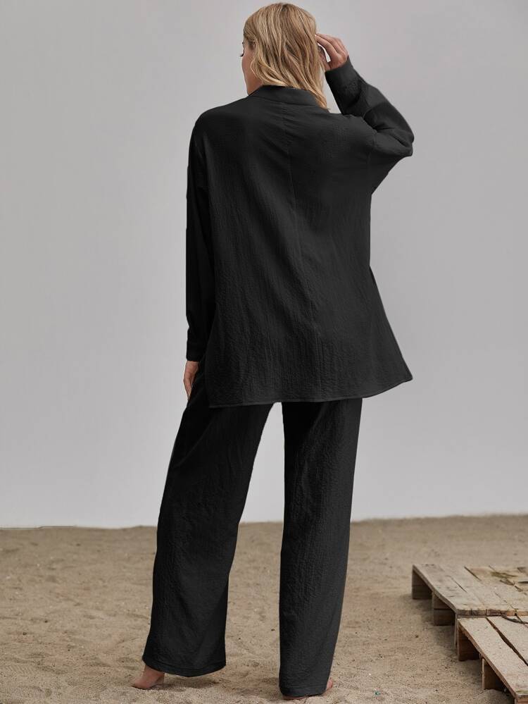 Ensemble blouse fendue et pantalon ample