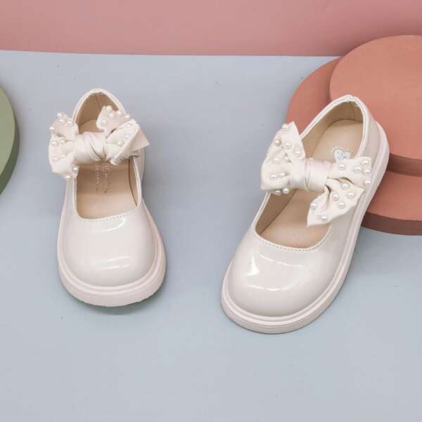 

Toddler Girls Bow & Faux Pearl Decor Mary Janes, Beige