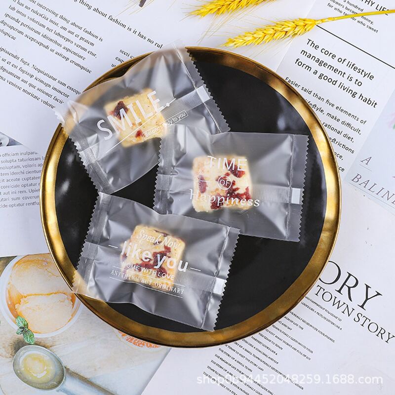 

100pcs Letter Graphic Biscuit Bag, Clear