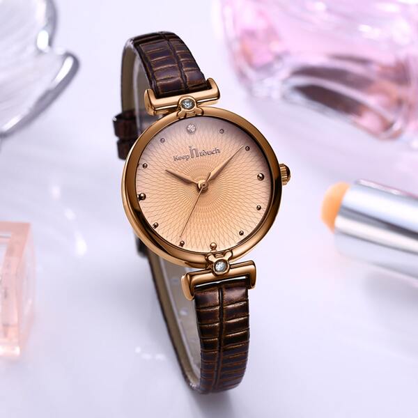 

Rhinestone Decor Round Pointer Quartz Watch