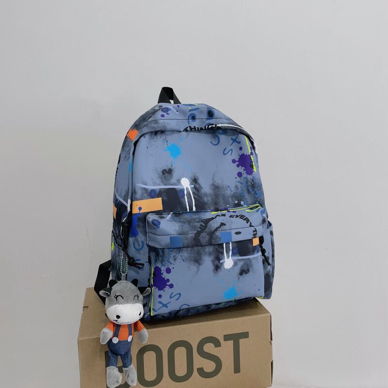 

Art Print Backpack with Cartoon Charm, Blue