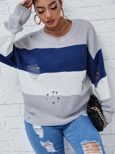 Pull à blocs de couleurs déchiré