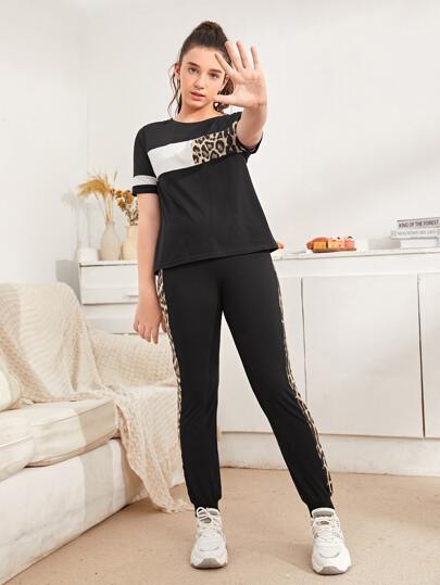 طقم توب بألوان متباينة وطباعة جلد الفهد وبنطلون فتاة