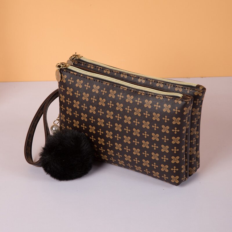 

Graphic Pattern Clutch Bag with Pom Pom Charm, Coffee brown