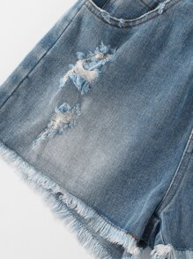 女孩條紋針織蕾絲邊上衣和破洞毛邊緣牛仔短褲