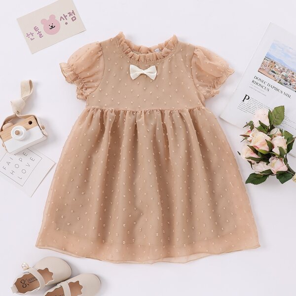 

Toddler Girls Swiss Dot Bow Front Babydoll Dress, Camel