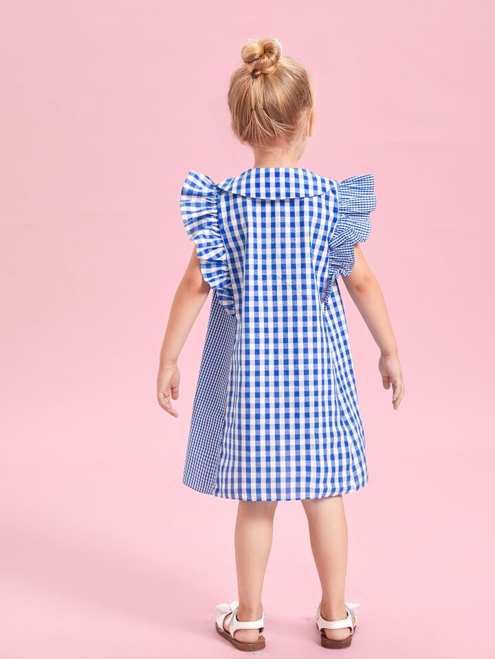 C'est le nouveau Fille Robe à carreaux à manches papillon à bouton