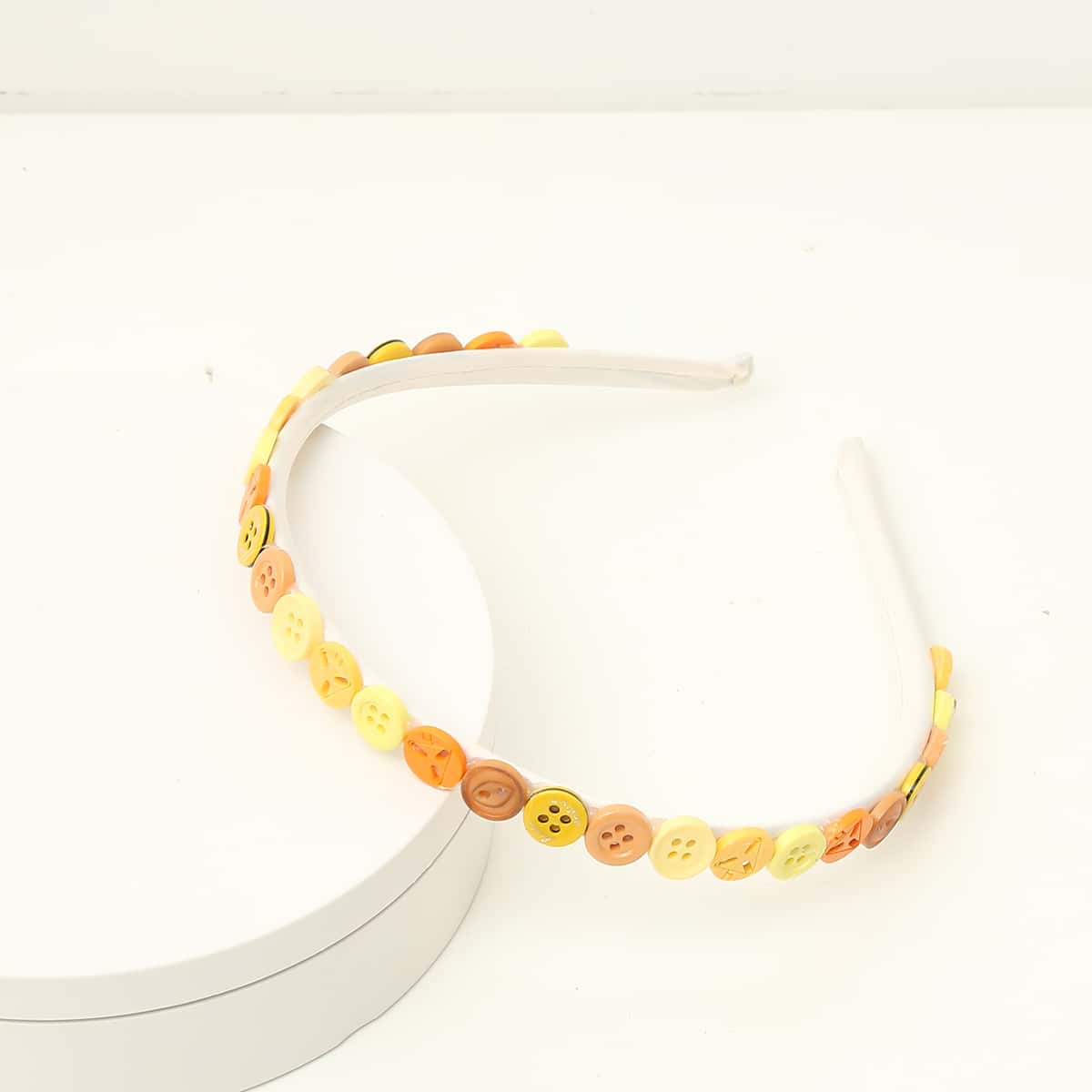 

Button Decor Headband, Yellow