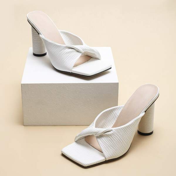 

Minimalist Textured Twist Lock Sandal Mules, White