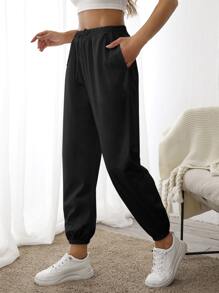 Quần Thể thao Nữ Dây kéo Túi màu trơn - màu đen - Xem 1