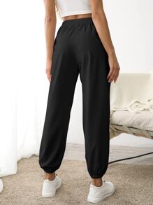 Quần Thể thao Nữ Dây kéo Túi màu trơn - màu đen - Xem 2