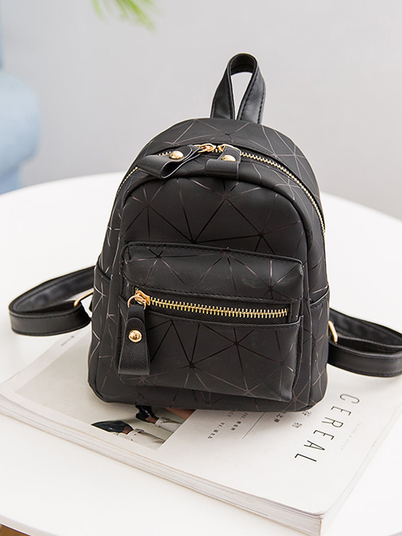 pocket front geometric backpack