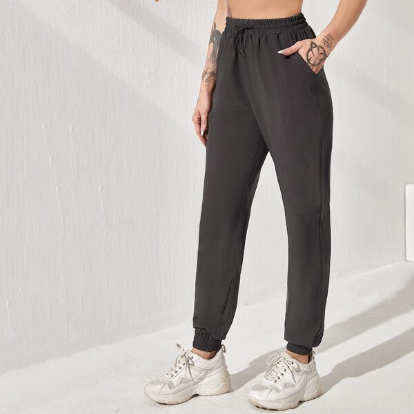 

Solid Drawstring Waist Pocket Sports Pants, Dark grey