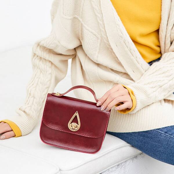 

Metal Decor Flap Saddle Bag, Burgundy