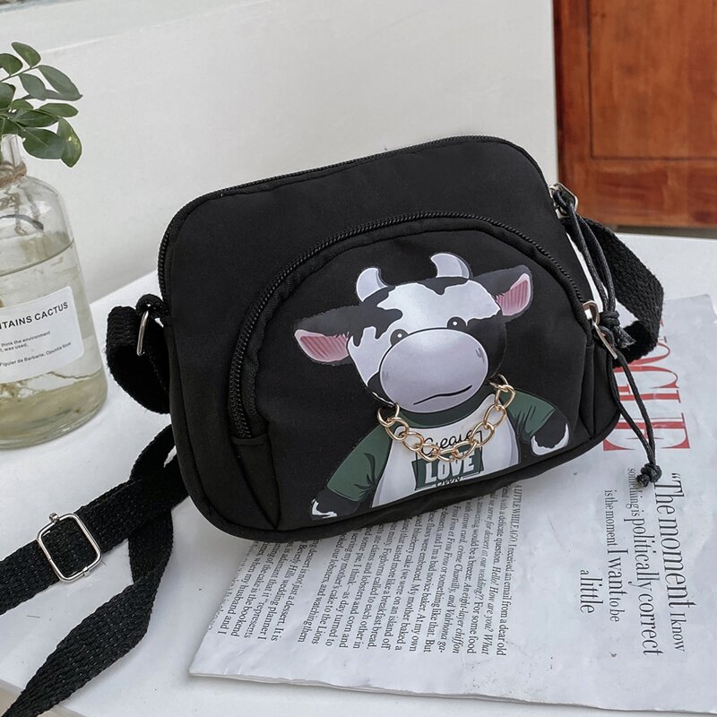

Cartoon Cow Print Crossbody Bag, Black