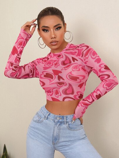 توب نصف شفاف بطبعات القلوب وتقويرة عالية الوقوف