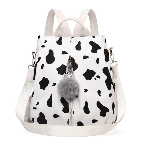

Cow Pattern Backpack With Pom Pom Bag Charm, Black and white
