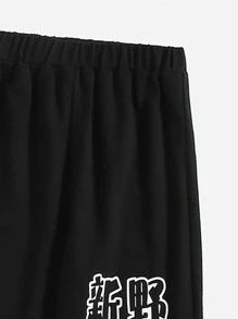 SHEIN 女孩中國龍和標語圖案衛褲 - 黑色 - 查看 4