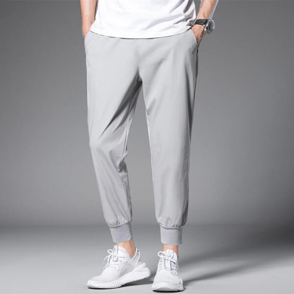 

Men Solid Drawstring Crop Carrot Pants, Grey