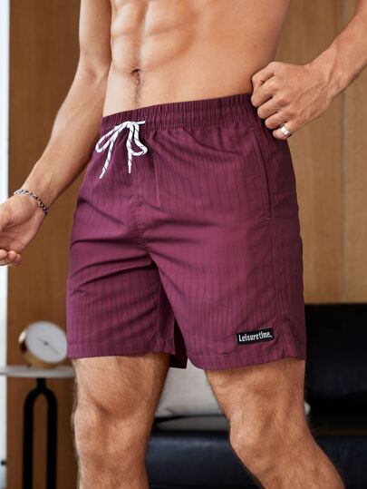 Surfspeed سراويل سباحة رجالية ذات حزام رباط بخصر وطباعة جيومترية عشوائية وشعارات، طراز هاواي