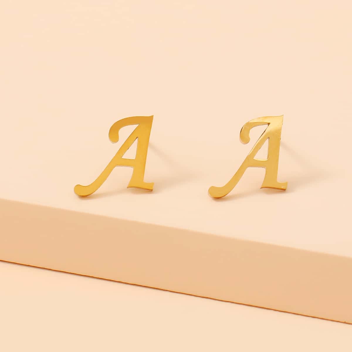 

Letter Design Stud Earrings, Gold