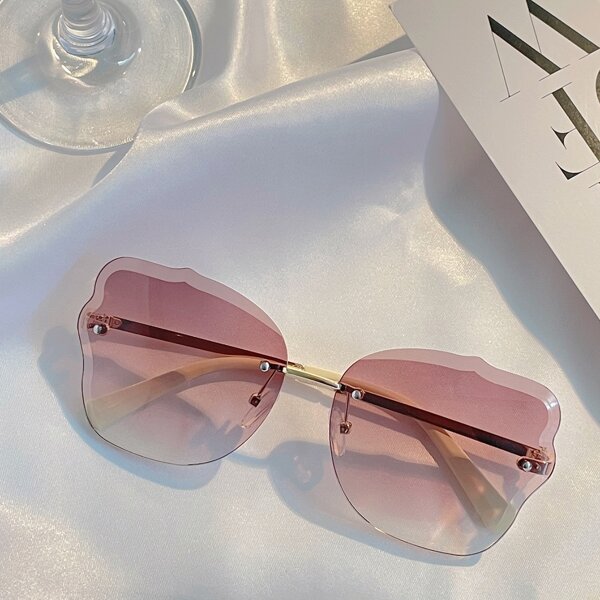 

Simple Tinted Lens Rimless Sunglasses