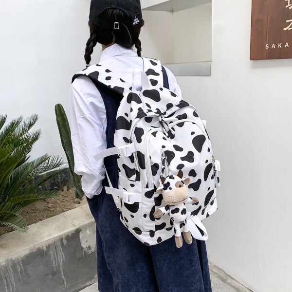 

Cow Print Functional Backpack With Bag Charm, Black and white
