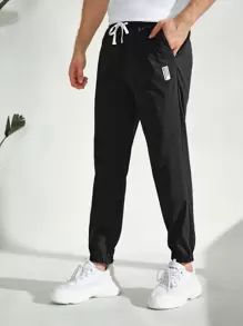 Manfinity Men Patched Detail Carrot Trousers - Black - View 1