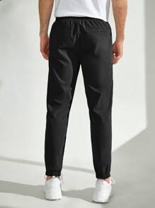 Manfinity Men Patched Detail Carrot Trousers - Black - View 2