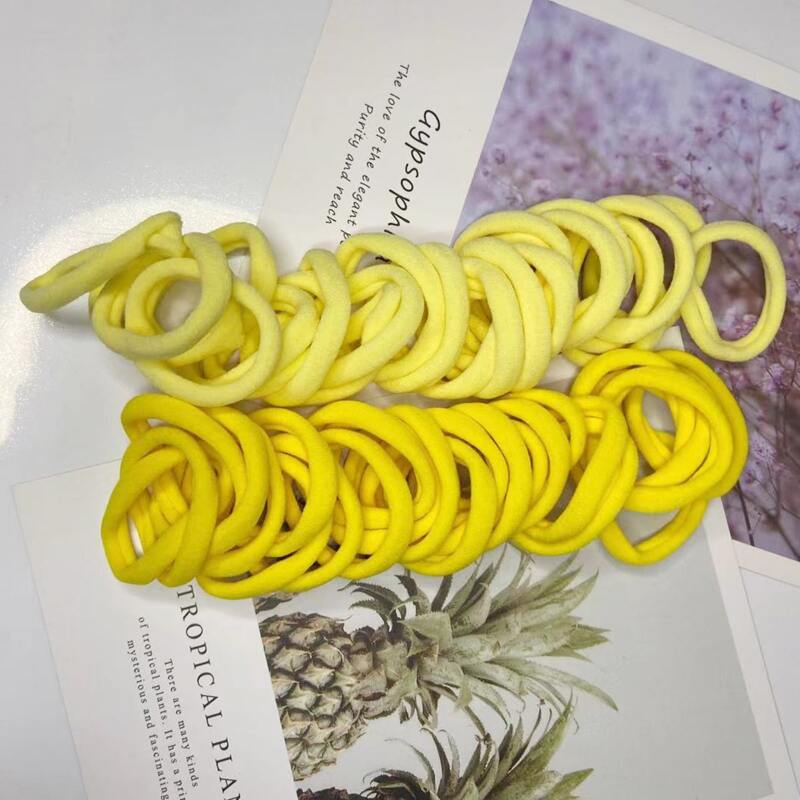 

50pcs Solid Hair Tie, Yellow