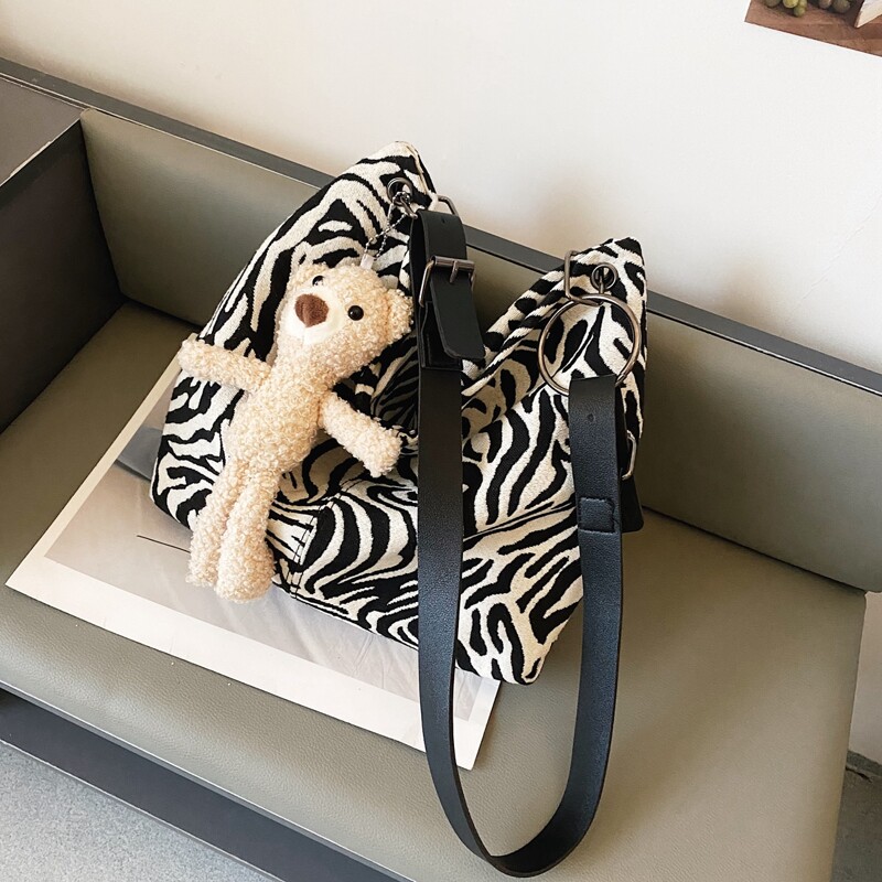 

Zebra Striped Pattern Crossbody Bag With Cartoon Charm, Black and white