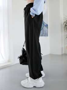 DAZY Quần bó sát túi xéo có dây rút - màu đen - Xem 3