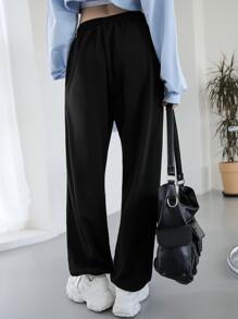 DAZY Quần bó sát túi xéo có dây rút - màu đen - Xem 8