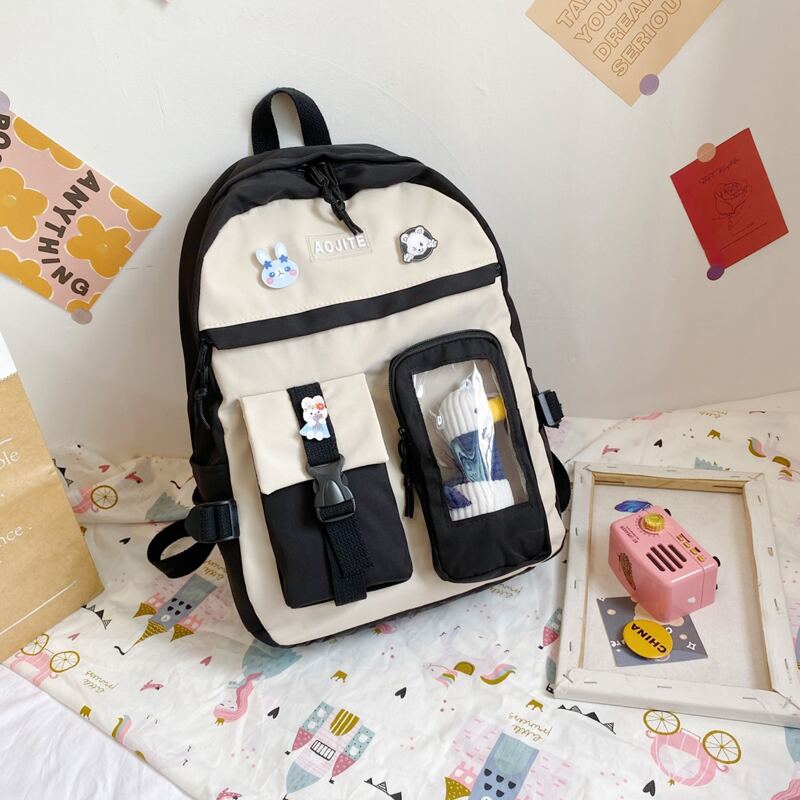 

Pocket Front Backpack With Cartoon Badge, Black