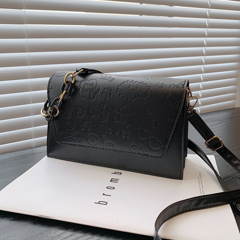 

Cartoon Embossed Flap Crossbody Bag, Black