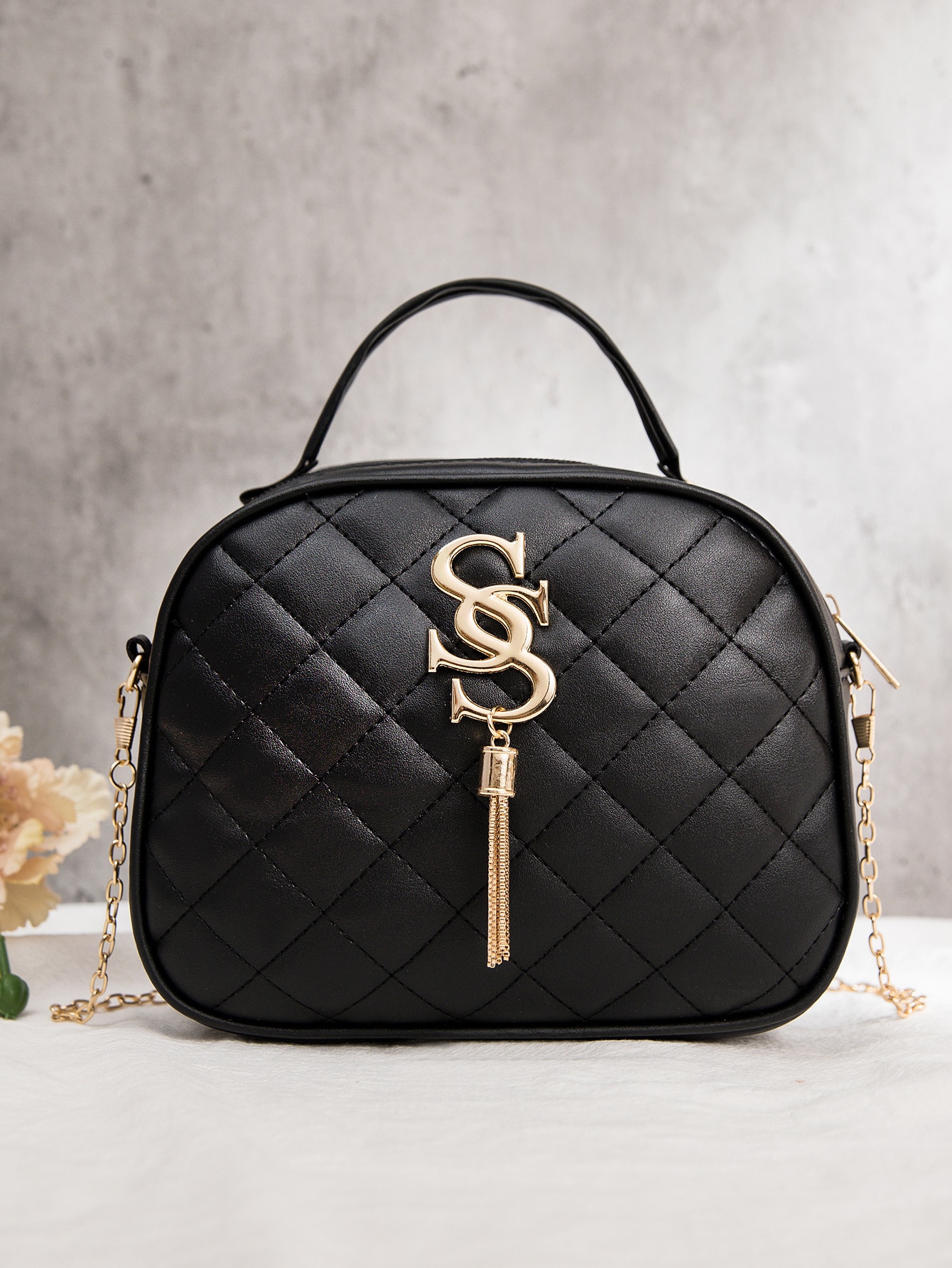 Quilted tassel satchel