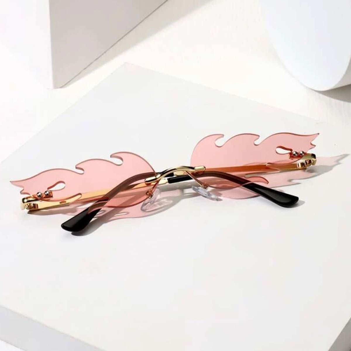 

Novelty Lens Rimless Sunglasses